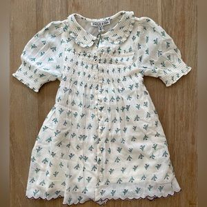 beautiful purple flower dress with smocking and scallop details